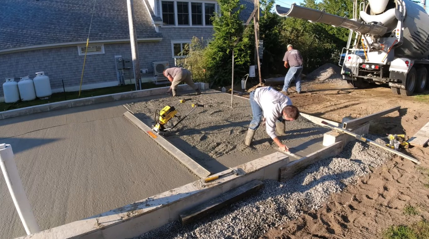 Professional concrete installation crew working in Fargo, ND